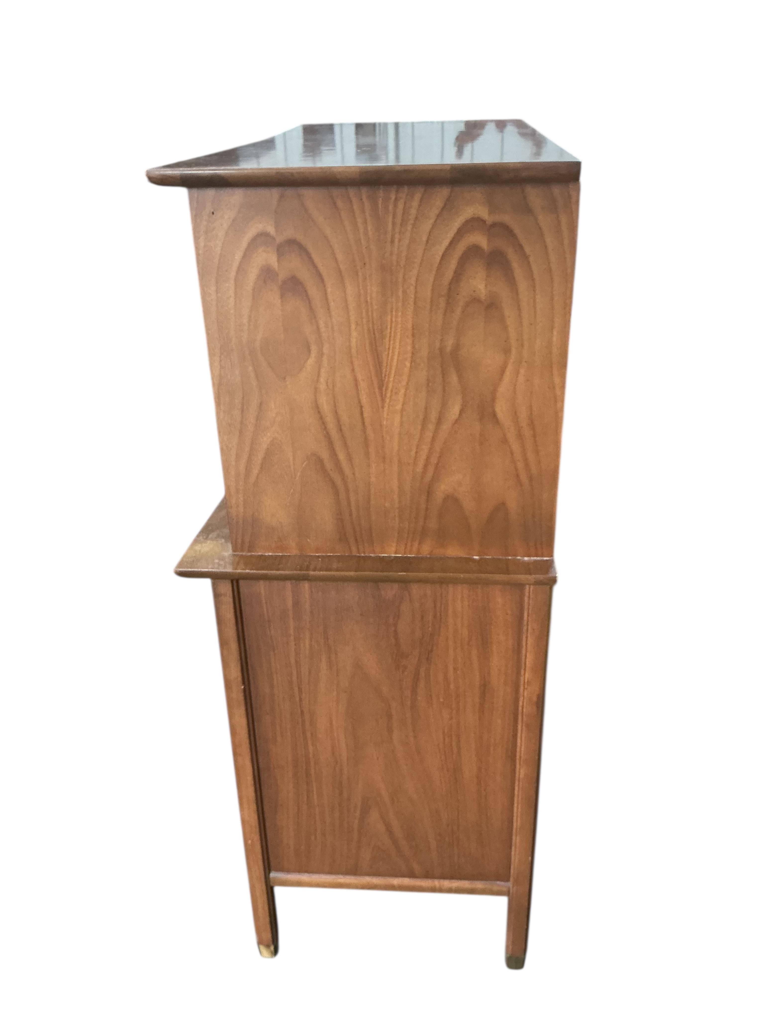 A mid century teak press cupboard, width 106cm, depth 49cm, height 128cm